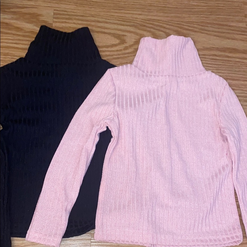 Black and Pink Turtleneck Sweaters